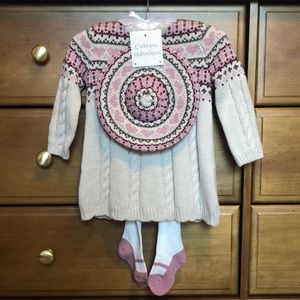 Baby sweater dress with tights and matching hat.